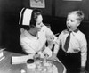 A Nurse Examining The Teeth Of A Boy In New York History - Item # VAREVCHISL019EC064