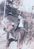 Clyde Barrow Dressed In A Suit And Standing With His Hand Place Through A Hold On A Road Sign. History - Item # VAREVCHISL018EC060