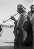 Bedouin Man Smoking A Long Pipe. History - Item # VAREVCHCDLCGCEC072