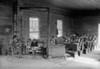 One Room School With 28 Students Of Various Ages. Bare Room Lacks Educational Equipment And Is Heated By A Wood Stove. Oakdale School Near Loyston History - Item # VAREVCHISL039EC434