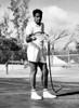 Tennis Player Pancho Gonzales Hosing Off His Courts In The Bahamas History - Item # VAREVCPBDPAGOCS002