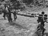 Native Carriers Transporting Allied Wounded In The Kokoda Campaign. Fought Between July And Nov. 1942 In Papua History - Item # VAREVCHISL037EC012