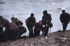 American Soldiers Help Others Whose Landing Craft Was Sunk Off Utah Beach On D-Day. The Survivors Reached The Beach Of Cherbourg By Using A Life Raft. June 6 History - Item # VAREVCHISL037TX285