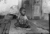 African American Child On A Dilapidated Porch History - Item # VAREVCHCDLCGBEC700