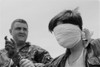 Blindfolded Viet Cong Pow. Us Marine Sergeant Guides A Blindfolded Pow In Quang Tri Province History - Item # VAREVCHISL033EC351