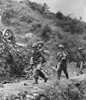 Wounded South Korean Soldier Carried To A First Aid Station By A U.S. Infantryman. Korean War History - Item # VAREVCHISL038EC135