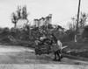 Two German Women Pushing Their Belongs In A Cart Past Demolished Buildings History - Item # VAREVCHISL036EC916