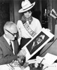 From Left Senator And Presidential Candidate Barry Goldwater Autographing A Portrait For 'Goldwater Girl' Carla Canete. Millbrae History - Item # VAREVCPBDBAGOEC002