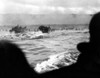 First Wave Of U.S. Invasion Troops Approach Omaha Beach During The D-Day Invasion Of Normandy. There Is A Smoke Screen On The Distance And Soldiers Advance Under Fire With Water Up To The Waist. June 6 History - Item # VAREVCHISL037EC194
