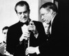 Nixon Presidency. Us President Richard Nixon Adjusts The Microphone For Frank Sinatra During Italian-American Night At The White House History - Item # VAREVCPBDRINIEC179