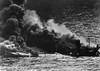 Allied Tanker Torpedoed In Atlantic Ocean By German Submarine During World War 2. The Ship Crumbled Amidships Under Heat Of Fire As She Settled Toward Bottom Of Sea. 1942. History - Item # VAREVCHISL036EC255