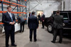 Five Secret Service Agents Guard President Barack Obama As He Signs Memorabilia Before Leaving The Gamesa Technology Corporation A Windmill Manufacturer In Fairless Hills Pennsylvania. April 6 2011. History - Item # VAREVCHISL026EC117