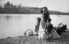 Mexican Women With Her Children And Bundles On The Edge Of The Rio Grande River. Ca. 1910. History - Item # VAREVCHISL016EC296