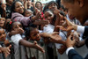 Students Hold Out Their Hands To Greet President Obama During His Visit To Dr. Martin Luther King Jr. Charter School In New Orleans. Oct. 15 2009. History - Item # VAREVCHISL027EC030