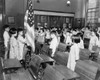 Class With Several Asian American Children Saluting The American Flag While Reciting The Pledge Of Allegiance In New York City'S Public School #23 On The Lower East Side Of Manhattan In 1940. History - Item # VAREVCHISL019EC177