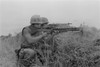 Vietnam War. Us Marine Machine Gunner And Rifleman Fire At The Enemy Near The Demilitarized Zone In Vietnam. May 13 History - Item # VAREVCHISL033EC544