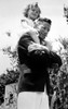 Shirley Temple Being Carried By Her Brother Jack Temple History - Item # VAREVCPSDSHTECS003