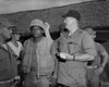 Actor John Wayne In Vietnam. John Wayne Signs Private First Class Fonsell Wofford'S Helmet During His Visit To The 3Rd Battalion History - Item # VAREVCHISL033EC330