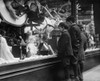 Three Boys Mesmerized By Xmas Toys In Shop Window In New York City. Ca. 1915. History - Item # VAREVCHISL023EC285