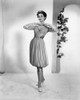 A Woman Modeling 1950S Fashion History - Item # VAREVCSBDFASHCS018