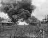 U.S. Marine Flame-Throwing Tank Attacks A Japanese Pillbox On Saipan. In Mid-Ground A Marine Watches From A Foxhole. Battle Of Saipan Was Fought From June 15-July 9 History - Item # VAREVCHISL037EC027