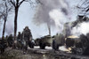 German Soldiers Passing Burning U.S. Equipment In The Beginning Of The Battle Of The Bulge. Dec. 16-22 History - Item # VAREVCHISL037TX260