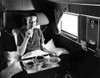 A Passenger Eats Breakfast On United Airline'S Douglas Mainliner Sleeper Airplane From Chicago To San Francisco History - Item # VAREVCHBDAVIACS027