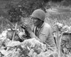 Native American Marine 'Code Talker' At An Observation Post Overlooking The City Of Garapan. During The Battle Of Saipan. June 27 History - Item # VAREVCHISL037EC038