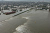 A Breech In A New Orleans Levee Floods Neighborhoods The Day After The Hurricane Katrina Hit The City. August 30 2005. History - Item # VAREVCHISL030EC122