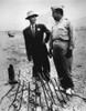 Gen. Leslie Groves And Dr. J. Robert Oppenheimer At Trinity Test Site In Sept. 1945. They Examine The Remains Of The Tower From Which The First Manmade Atomic Explosion Was Detonated Near Alamogordo History - Item # VAREVCHISL037EC436