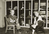 Children Take Off Their Shoes Before A Nap In A Public Nursery During World War 2. Open From 6 Am To 6 Pm History - Item # VAREVCHISL036EC875
