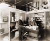 Two Men In Vault At The Treasury Department For Daily Working Funds. On The Table Are Bags Of Coin History - Item # VAREVCHISL008EC105