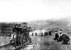 Austrian Atrocities In Serbia. A Long Line Of Blindfolded And Kneeling Serbian Men Near The Austrian Lines Were Ruthlessly Shot At A Command. One In Five Serbian Died During World War I. Ca. 1914-1918. History - Item # VAREVCHISL034EC566