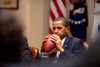 President Barack Obama Pensively Holds A Football While Listening To A Briefing With Advisors In The Roosevelt Room Of The White House. May 4 2009. History - Item # VAREVCHISL025EC275