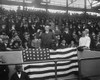 President Warren Harding Throwing Out The First Ball At Washington Game. Seated At Left Is First Lady Florence Harding. At Right Is Advertising Man Albert Lasker History - Item # VAREVCHISL040EC777