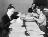 Workers Checking Names And Numbers At New York Selective Service Headquarters. On March 17 History - Item # VAREVCHISL037EC937