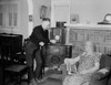 A Husband Tunes The Radio While His Wife Holds Populist Right-Wing Radio Priest History - Item # VAREVCHISL020EC131