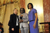 Hillary Clinton And Michelle Obama With International Women Of Courage Award Honoree Jestina Mukoko For Her Work As Executive Director Of The Zimbabwe Peace Project That Monitors Human Rights Abuses In Zimbabwe. History - Item # VAREVCHISL027EC088