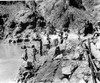Zuni Tribe-Members Of The Zuni Tribe On Top Of Rock Formation Overlooking A Body Of Water. - Cpl ArchivesEverett Collection History - Item # VAREVCHBDZUTRCL001