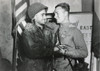 U.S. Lt. William Robertson And Soviet Lt. Alexander Sylvashko Embrace. Behind Them Is A Sign History - Item # VAREVCHISL037EC761