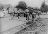 War For Indonesian Independence Began In 1945. Soldiers Running Down Street With Revolutionary Billboards In The Background. - History - Item # VAREVCHISL038EC730
