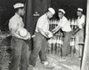 African American Ammunition Handlers In The U.S. Navy During World War 2. They Pass Shells For 6-Inch Guns In Magazines At The Naval Ammunition Depot On Espiritu Santo In The New Hebrides. L-R Dodson Samples History - Item # VAREVCHISL036EC925
