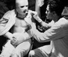 U.S. Sailor Dressed In Pressure Bandages After Suffering Burns During A Kamikaze Attack. He Is Being Fed Aboard The Hospital Ship History - Item # VAREVCHISL036EC962