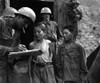 Two Young North Korean Soldiers Taken Prisoner In The Sindang-Dong Area. They Are Interrogated By A U.S. Soldier Shortly After Their Capture. Sept. 18 History - Item # VAREVCHISL038EC140