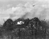 U.S. Airplane Drop Bombs On The Enemy Area In The Hills Of Peleliu Island. Sept.-Nov. 1944. World War 2 History - Item # VAREVCHISL036EC703