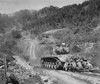U.S. Marine Infantrymen Take Cover Behind A Tank While It Fires On Communist Troops Ahead. Hongchon Area History - Item # VAREVCHISL038EC079