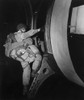 Fully Loaded U.S. Paratrooper Climbs Into A Glider That Will Land Behind The Normandy Beaches. The Airborne Troops Captured Strategic Roads And Bridges To Block German Resistance On D-Day. June 1944 History - Item # VAREVCHISL037EC101