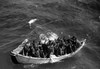 Survivors Of Uss Princeton In Life Boat As Seen From Uss Cassin Young. Uss Princeton Was Sunk In The Battle Of Leyte Gulf On Oct. 24 History - Item # VAREVCHISL036EC724