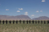 Afghanistan National Army Soldiers Form A Line While Participating In An Unexploded Ordinance Field Training Exercise Conducted By U.S. Army. Kubal May 23 2002. History - Item # VAREVCHISL024EC167