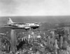 A United Airlines Plane Flies Over Manhattan History - Item # VAREVCHBDAVIACS040